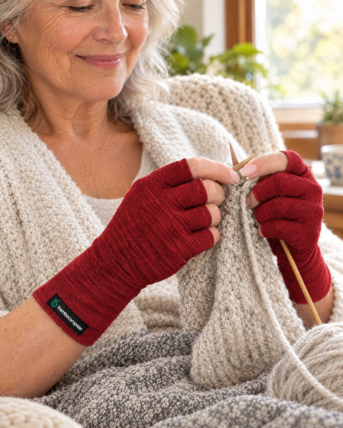 Person wearing the FLEX+ Bamboo Compression Gloves | Bamboo - Red